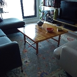 Une photo du tapis d'une cliente dans sa maison
